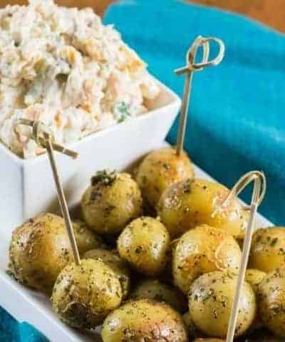 Roasted Creamer potatoes on a plate with Million Dollar Dip