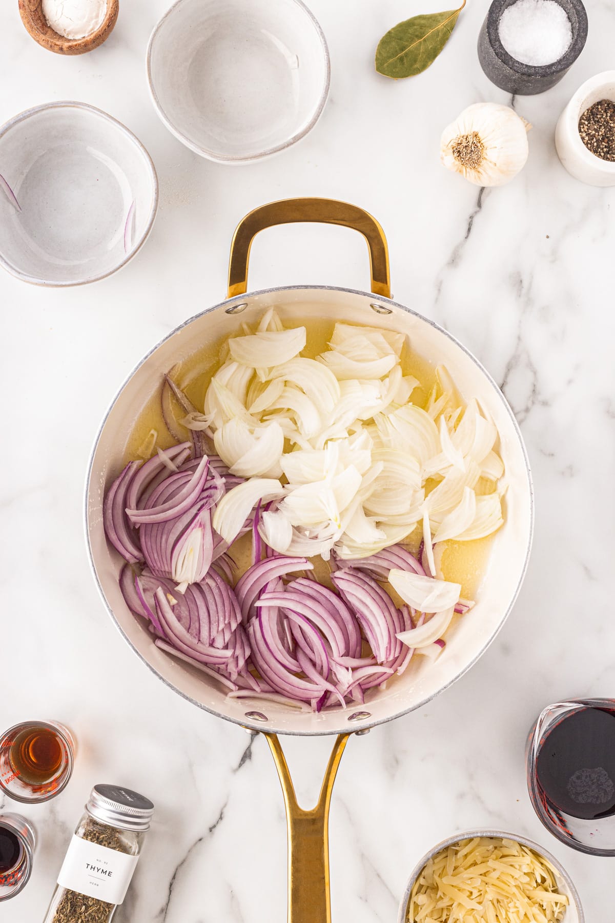 This French Onion Soup for Two is the perfect meal for a cold night in February for Valentine's Day or any night for that matter. Onions added to a pan.