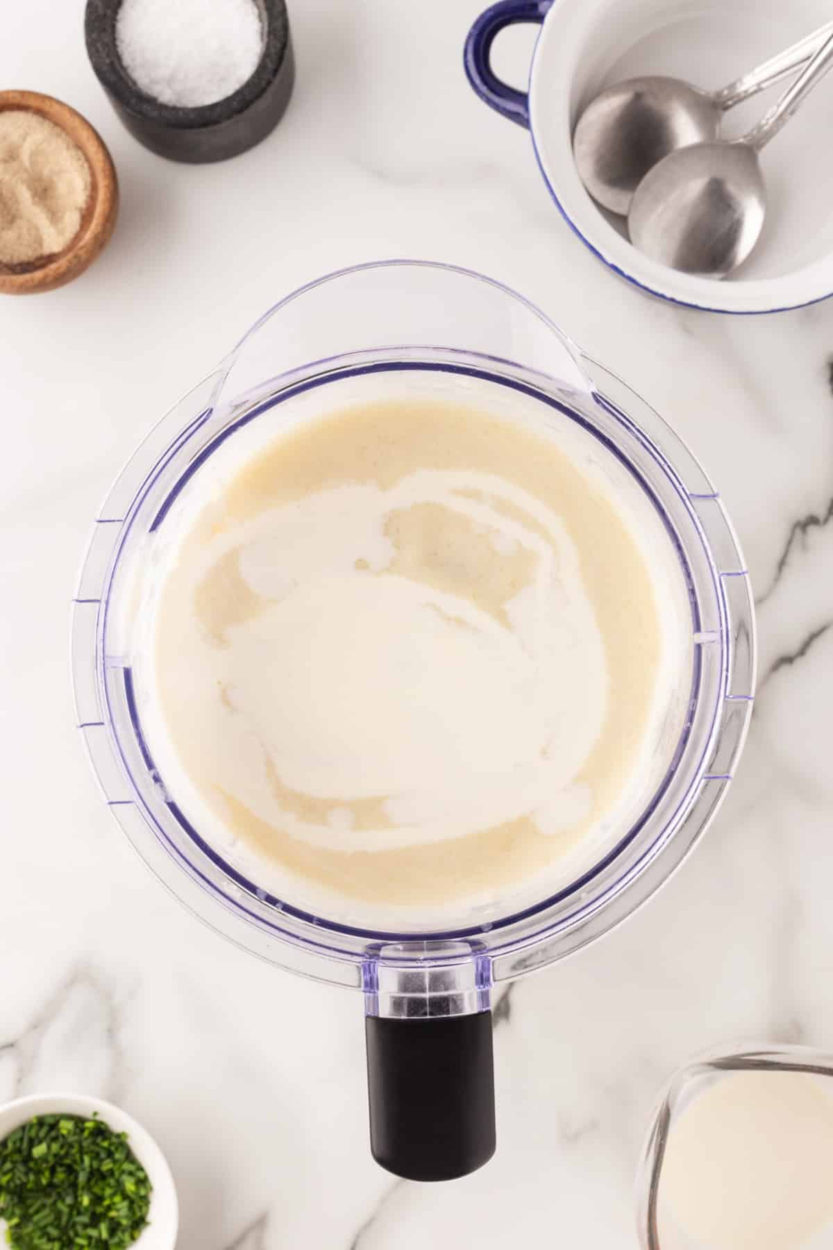 This recipe for Julia Child's Vichyssoise is one of my all-time favorite soup recipes. It is delightfully creamy and smooth, and a perfect summer soup served cold. Adding cream to the soup.